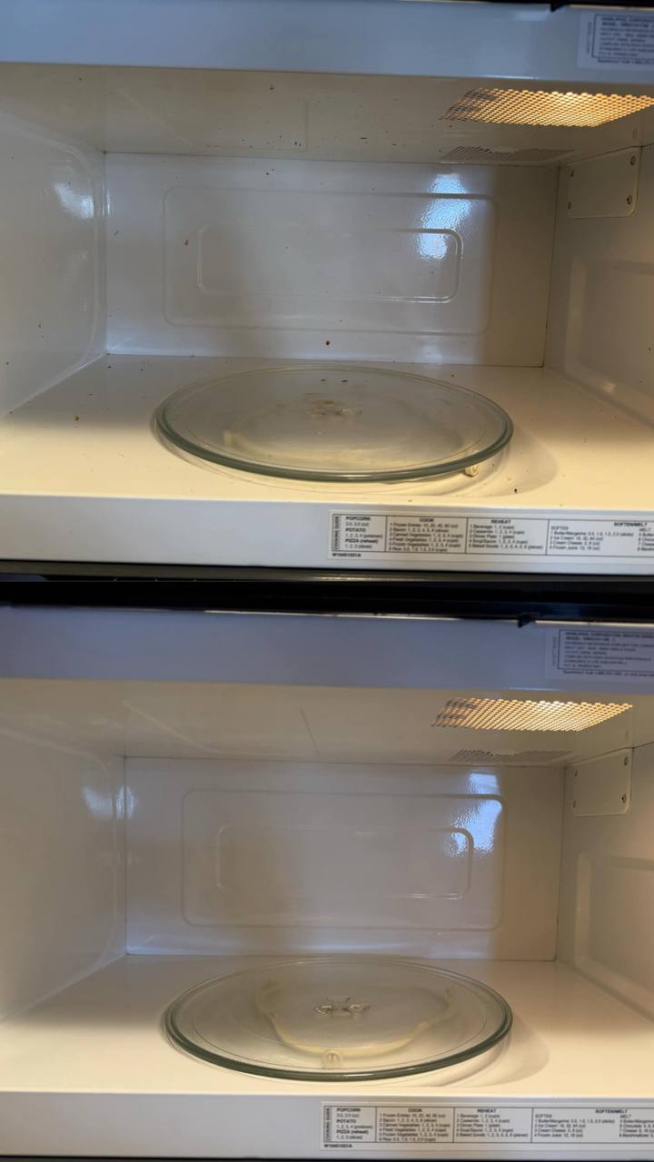 Shining white microwave oven with a glass tray